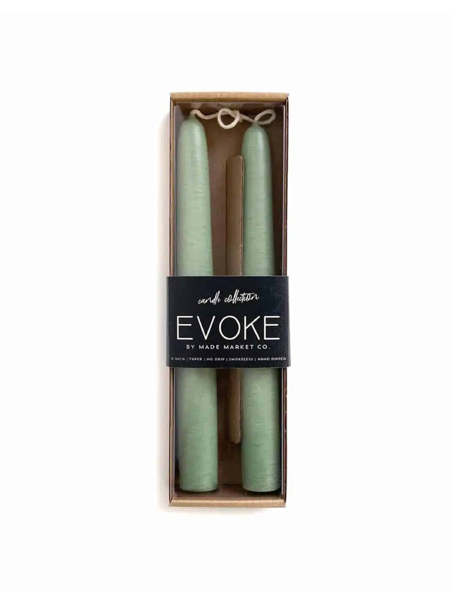 Boxed set of two hand-dipped succulent green taper candles with black Evoke label.