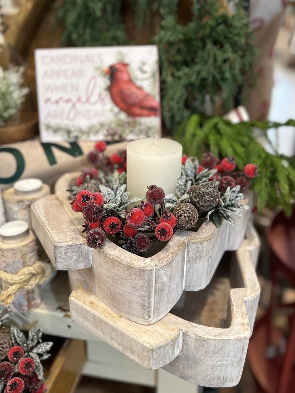 Small Christmas Tree Dough Bowl in a white-washed wood finish styled with frosted greenery, red berries, and a pillar candle.